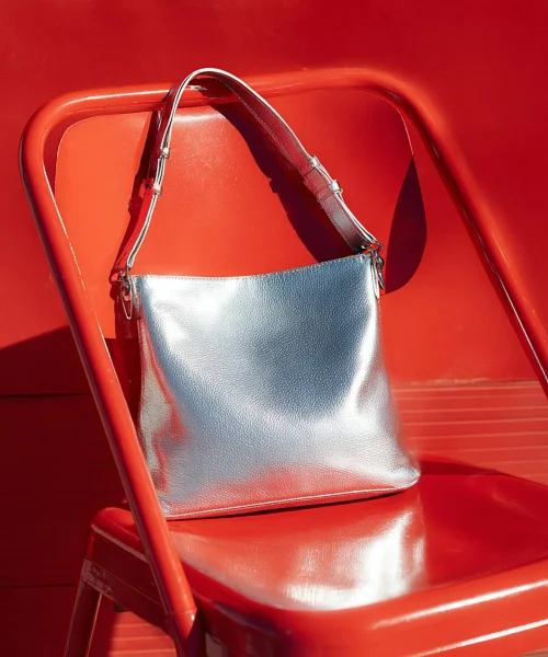 6866f4d868cd0a577ebdcd44_Silver Handbag Display